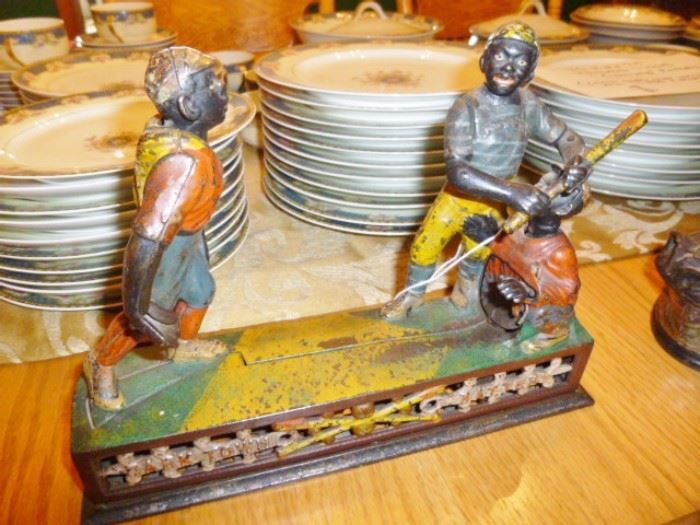 several early cast iron toy banks