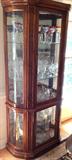 narrow cherrywood curio with light and all glass shelves