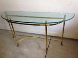 glass and brass demi lune table