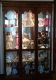 Nice Oak Showcase filled with Dolls and pretties