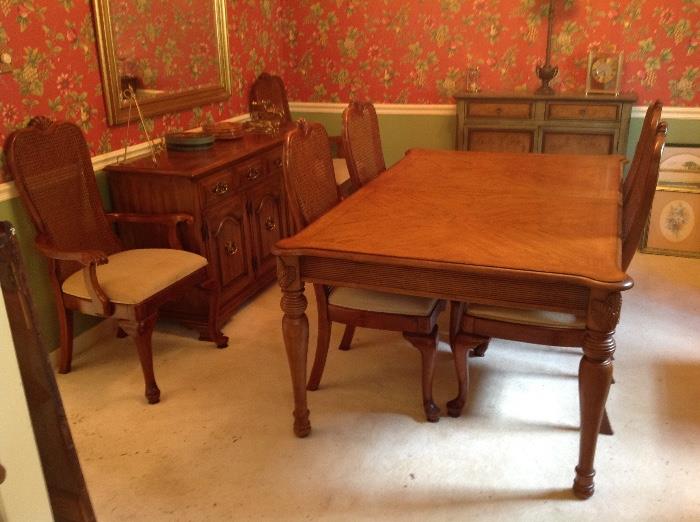 Oak Dining Table w/ Two Leaves, Two Cane Back Upholstered Seat Dining Captains Chairs and Four Cane Back Upholstered Seat Dining Side Chairs