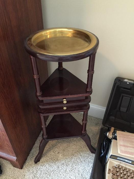 #30 small table with brass top $35 29.5tx10.5w — at Town Park Drive SW.
