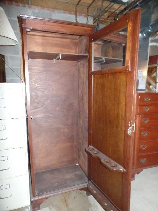 Inside view of Wood cabinet, great for hanging extra clothes