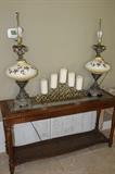 Sofa table and two matching table lamps.
