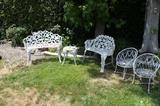 6 pieces of iron patio furniture.