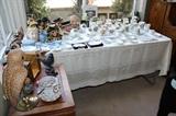 Nesting tables, bird statues, bone china, some rare and hard to find character/Toby jugs. Commemorative Royal cups/mugs, Peter Rabbit childs plate and beaker.