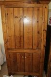 Distressed pine armoire.