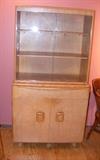 Two piece Glass top hutch with 2 door and one drawer bottom. Heywood Wakefield