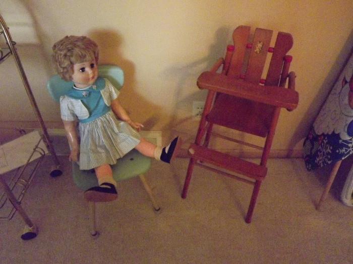 Allied Eastern (AE) doll sitting on a American Seating AmerFlex child's chair, doll high chair