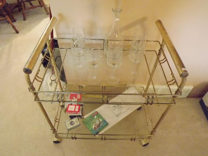 Brass and glass cart. Perfect for setting up your bar.