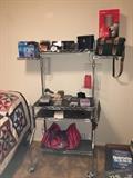 chrome desk, office supplies, quilt, camcorder