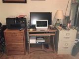 file cabinets, printer, desk, large monitor