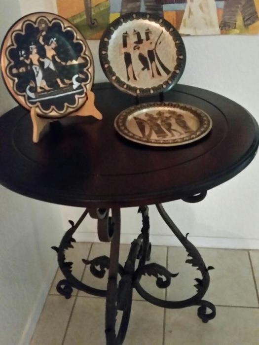Wood and rod iron decorative side table and metal plates