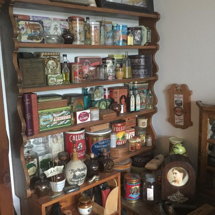lots of tins, apothecary stuff (hundreds of medicine bottles), stoneware jugs