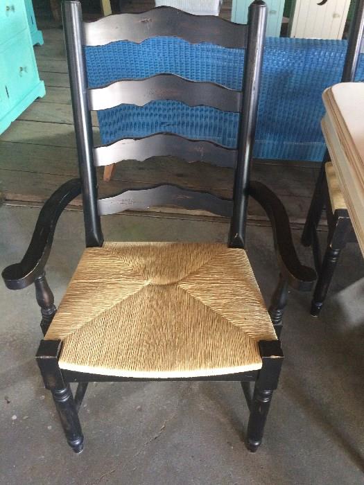 Asking $1,600 for set.  $200 a piece.  8 Black Ethan Allen Heavy dining room chairs.  Two with arms.  Worn look from family.  Rattan all in excellent condition