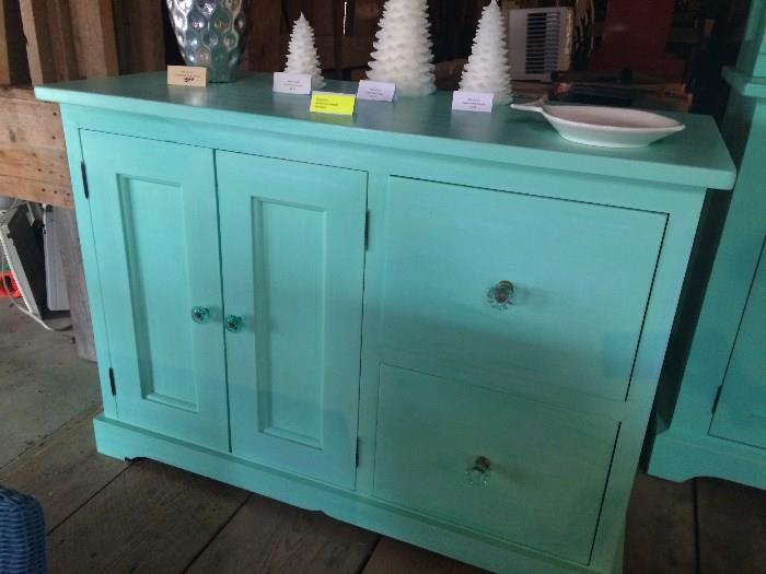 Asking $1,250.  Sea Rose Aqua Side Board for dining room for living room. Adjustable Shelves.  Bead Board in drawers.  Excellent Condition