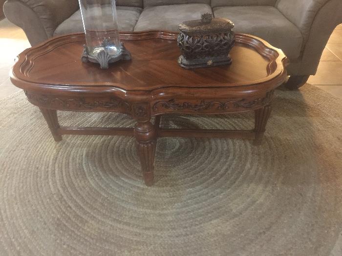 Coffee table with carved accents