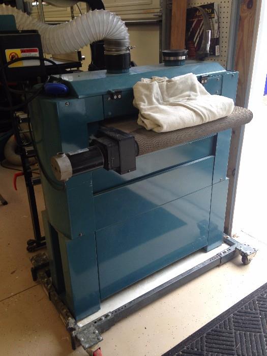 North State 3 HP,  25 inch Variable Speed industrial enclosed Drum  Sander on rolling base.  Includes New and partial rolls of sand paper.