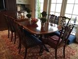 Ethan Allen Dining Table plus 6 side chairs and 2 arm chairs with claw & ball feet. 2 leaves and pads included. Also Oriental rug.