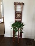 Antique Chinese washboard with plant