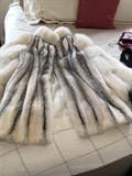 Mink coat with fox sleeves.