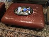Brown leather ottoman