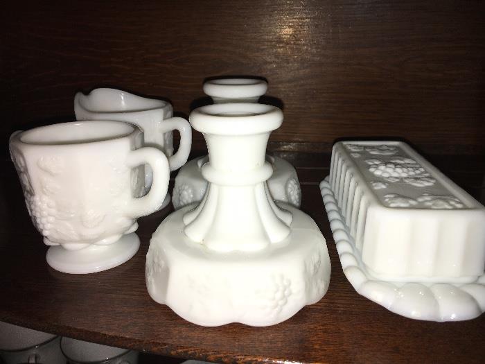 Vintage milk glass cream & sugar, candle holders and butter dish.