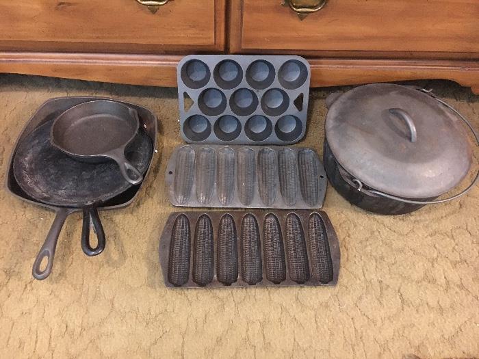 Cast Iron cookware--corn stick pans, muffin pan, 8 quart Dutch oven, skillets and griddle.