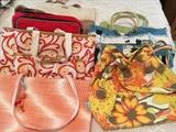 Several colorful bags and totes.