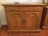 Solid oak Jamestown Sterling dining room group--corner cabinet, china cabinet/breakfront, server, oval table with two 18" leaves, 6 chairs (2 host, 4 side). Will sell separately or as set.