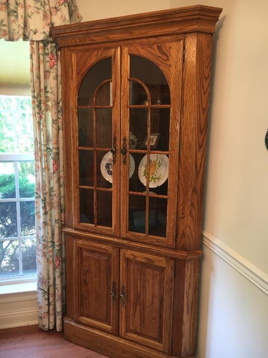 Solid oak Jamestown Sterling dining room group--corner cabinet, china cabinet/breakfront, server, oval table with two 18" leaves, 6 chairs (2 host, 4 side). Will sell separately or as set.