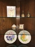 Decorative brass bells and high-relief floral plates from England.