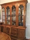 Solid oak Jamestown Sterling dining room group--corner cabinet, china cabinet/breakfront, server, oval table with two 18" leaves, 6 chairs (2 host, 4 side). Will sell separately or as set.