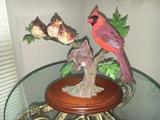 Decorative Danbury Mint bird figurine.