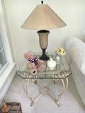 Glass and metal end table, lamp and decor.