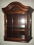 Beautiful wall curio cabinet.