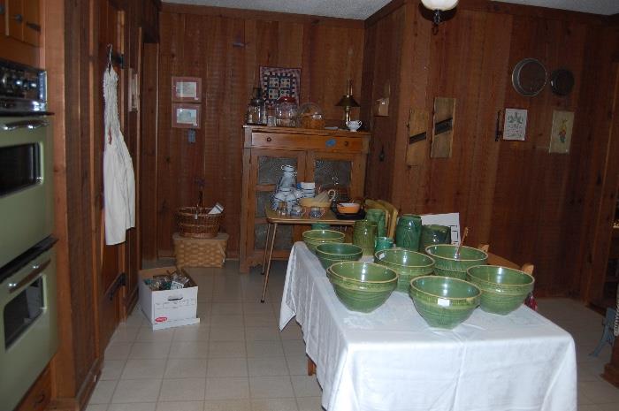 Large collection of antique green "yellow ware".
***Pie Safe in background marked with blue tape is NOT FOR SALE.