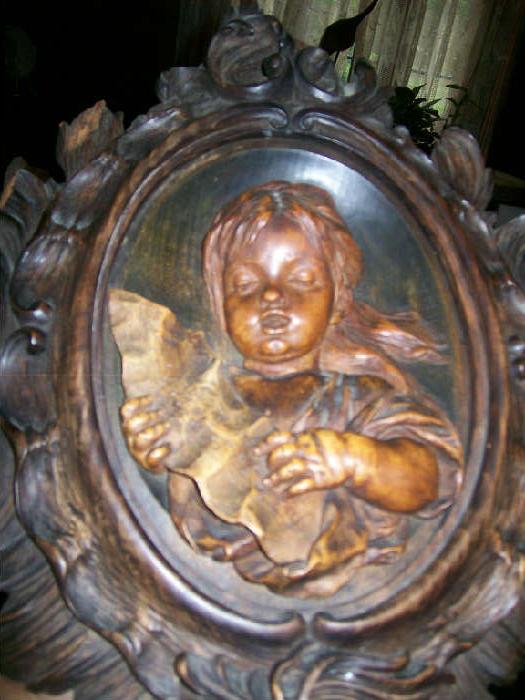 1 of 2 Carved Wooden Plaques