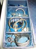 Lots of Jewelry (Not Shown)