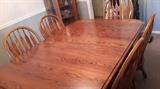 Solid oak excellent condition expands to 12 feet with 8 chairs kitching /dining room table