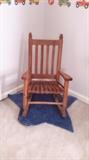 Child's wooden rocker and star rug