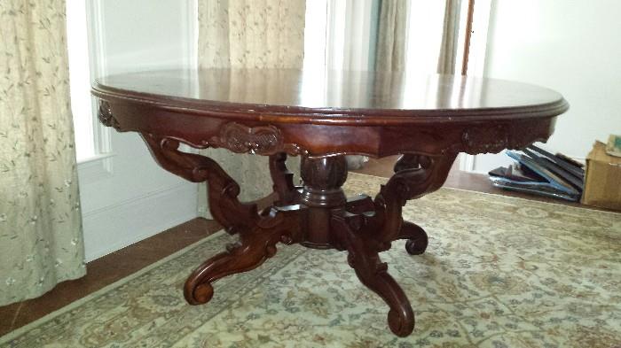 Solid hand carved Mahogany table 60" diameter. 