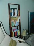 step bookcase - conserves space, but holds a lot