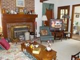 tv, tv stand, clock, Butler Brown print, floor lamps, library chair/steps, crocks, misc.