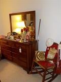 cherry dresser with mirror, rocker, oil lamp, candlesticks