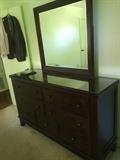 Large dresser with mirror, from Ashley Furniture, one discolored spot on top, glass top included