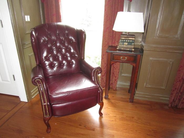 burgundy leather library chair, tufted with nail head embellishments 