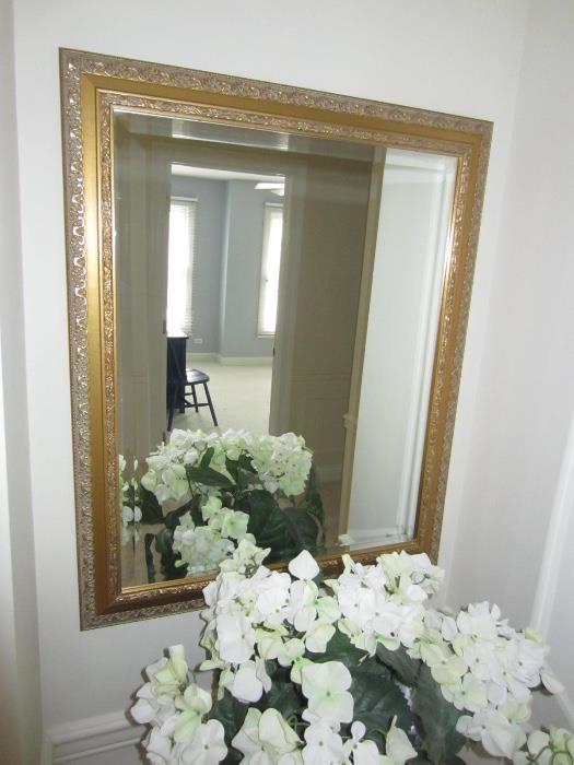 gilded mirror, silk flowers
