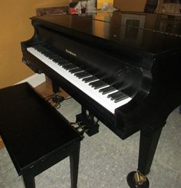 Baldwin grand piano, black with ivory keys and matching bench also concert Master Player system