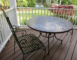 outdoor tile top iron base table and 2 chairs